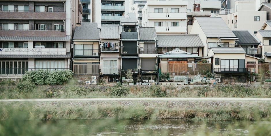 Charming traditional houses by the river in Kyoto, capturing authentic Japanese architecture.