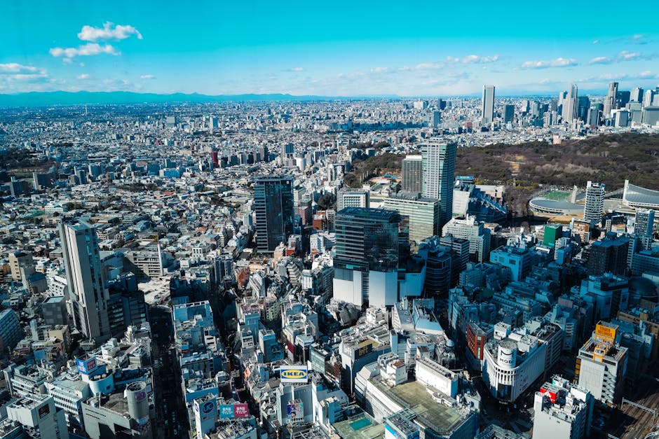 A stunning aerial shot of Tokyo showcasing its sprawling urban skyline and famous landmarks.