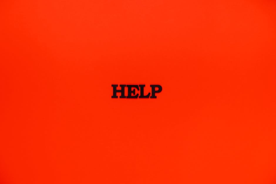 Minimalist red background featuring the word 'HELP' in bold text.