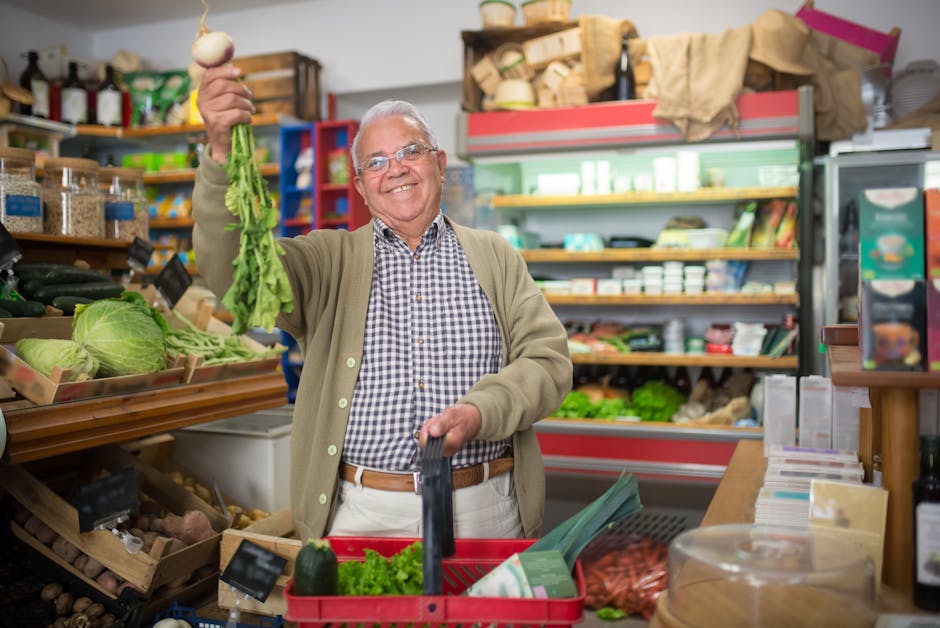 Elderly man joyfully buying fresh produce at a local grocery store.