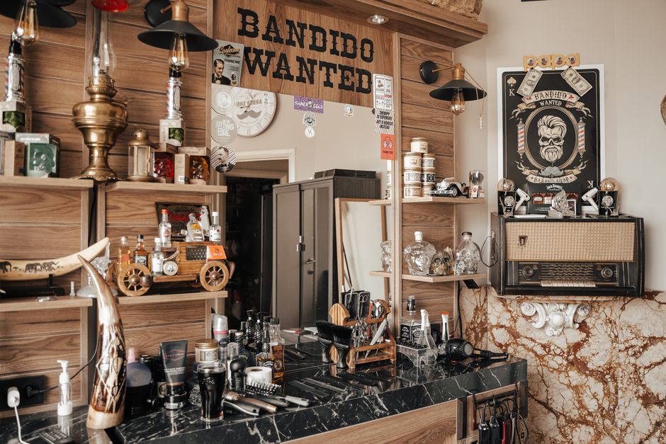 Explore a rustic and modern barber shop interior filled with unique decor elements and classic barber tools.