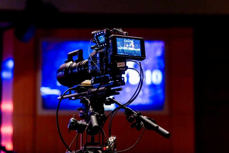 High-tech video camera setup in modern studio environment, showcasing professional equipment for filming.